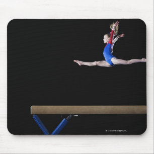 Gymnast (9-10) leaping on balance beam 2 mouse mat