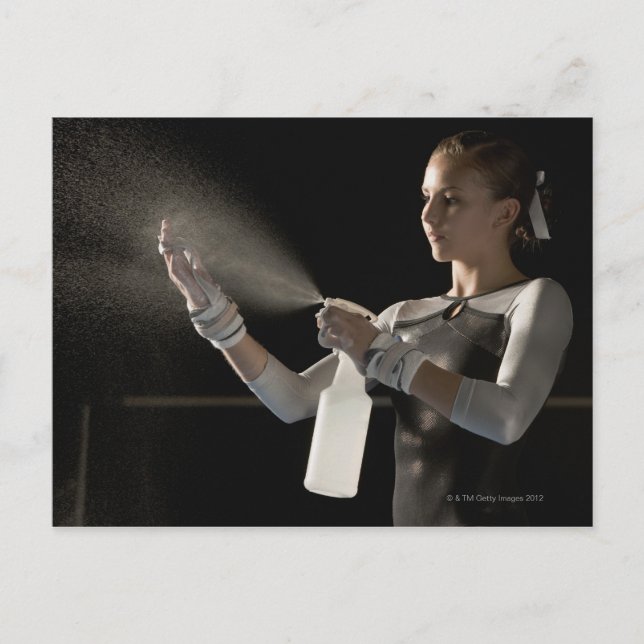 Gymnast spraying water on hands postcard (Front)