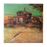 Gypsies with Caravans by Vincent van Gogh Tile<br><div class="desc">Encampment of Gypsies with Caravans by Vincent van Gogh is a vintage fine art post impressionism daily life travel and transportation painting featuring a group of gypsies with their wagons. The horses and oxen are resting and eating underneath the trees in a field or meadow. About the artist: Vincent Willem...</div>