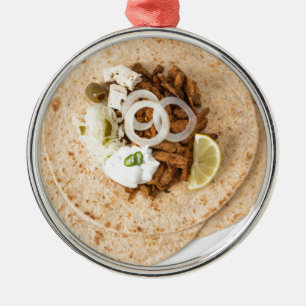 Gyros pita with tzatziki coleslaw olives and feta metal tree decoration