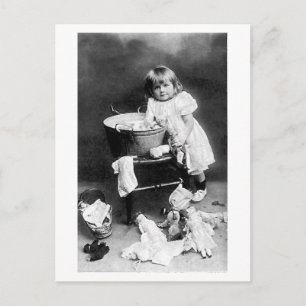 h304 Edwardian Girl with Dolls Clothes Postcard
