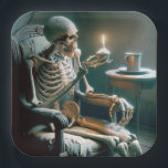 Halloween Birthday Skeleton  Paper Plate<br><div class="desc">A skeleton sits in a worn armchair holding a cupcake with a lit birthday candle for a Halloween birthday Party.
Text can be changed or deleted</div>