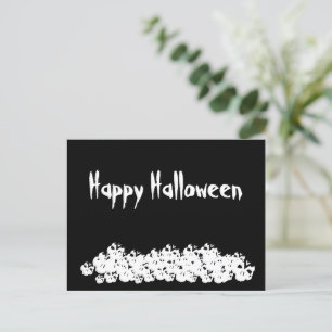 Halloween black white skulls pile custom text postcard