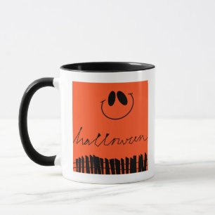 Halloween designs on orange mug