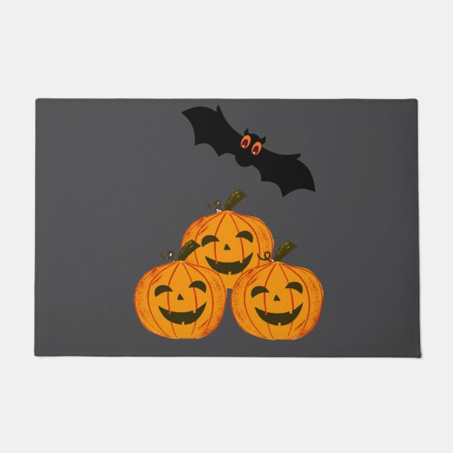 Halloween funny. Pumpkins and a flying bat. Doormat (Front)