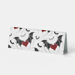Halloween heart with black bat wings