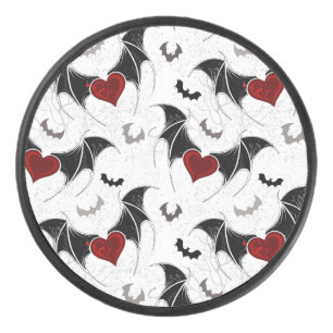 Halloween heart with black bat wings hockey puck