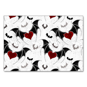 Halloween heart with black bat wings table number