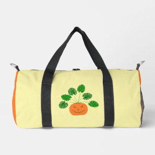 Halloween Monstera Plant in Pumpkin Duffle Bag