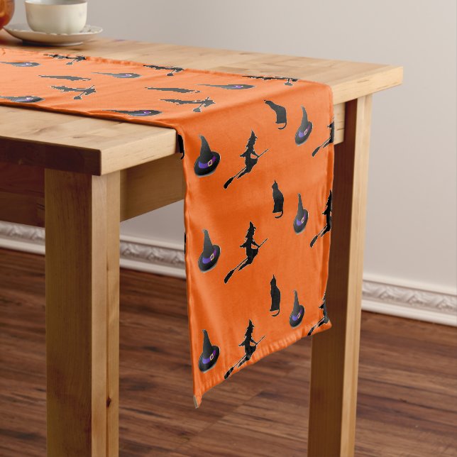 Halloween pattern on orange short table runner (In Situ)