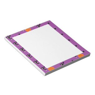 Halloween pattern on purple notepad