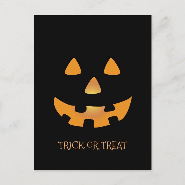 Halloween pumpkin face on black background postcard (Front)