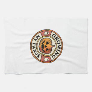 Halloween Pumpkin Growing My Fangs Vintage Badge_1 Tea Towel