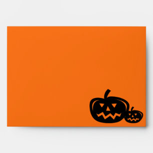Halloween pumpkin head carving orange and black envelope