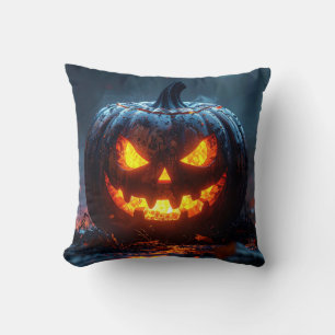 Halloween pumpkin lantern with glowing eyes, dark cushion