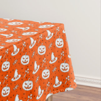Halloween Pumpkin Witch Hat on Large Orange Tablecloth