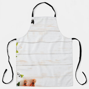 Halloween pumpkins, bats, spider top view. apron