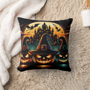 Halloween pumpkins glow under a full moon at dusk cushion