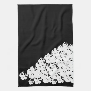 Halloween scary white skulls pile black tea towel