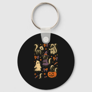 Halloween skunk skeleton mummy witch ghost key ring