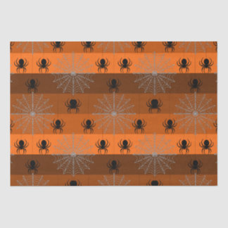 Halloween spider webs with spiders on orange. wrap tissue paper