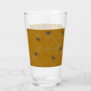 Halloween spiders web and pumpkins glass