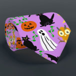 Halloween Theme Collage Toss Pattern Purple Tie<br><div class="desc">This whimsical Halloween toss pattern is made mostly in orange and black on a light purple background. It includes white ghosts, black cats and bats, orange pumpkins and light-orange owls. It's a cute cartoon design to help you celebrate at your spooky party. This design is appropriate for a kids' party...</div>
