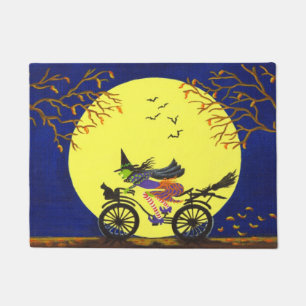 Halloween witch on bicycle door mat