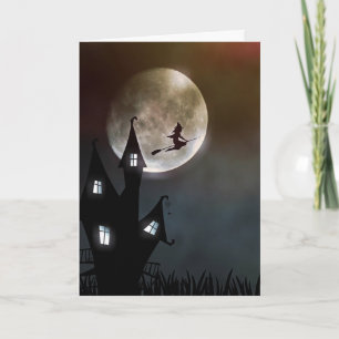 Halloween with witch flying in the moon and house card