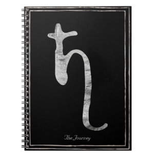 Hammered silver stylised planet Saturn symbol Notebook