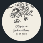 Hand Drawn Doodles Floral Wedding Classic Round Sticker<br><div class="desc">Whimsical charcoal black and cream wedding invitations with trendy hand-drawn doodles are a charming and creative way to invite guests to a celebration filled with love, laughter, and good food. Featuring charcoal black line art on a soft cream background, this playful design includes doodles of floral arrangements, wedding rings, champagne...</div>