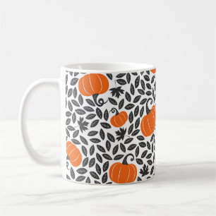 Hand drawn seamless pattern with pumpkins and leav coffee mug
