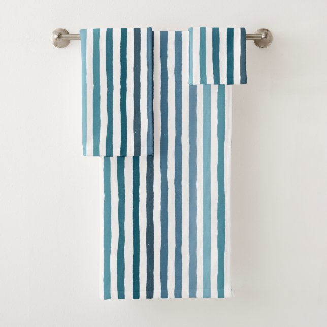 Hand-drawn stripes in shades of sea-inspired blue bath towel set (Insitu)