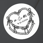 Hand Drawn Vintage Cake Whimsical Wedding Classic Round Sticker<br><div class="desc">Personalised Vintage Cake Wedding Monogram Stickers. These custom round wedding stickers feature a simple vintage-style cake illustration at the centre, topped with the couple’s monogram initials and wedding date for a timeless and elegant touch. With cute bow details. The minimalist design uses a mix of classic serif and handwritten script...</div>