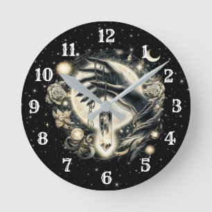 Hand Holding a Crystal under the Moonlight Round Clock