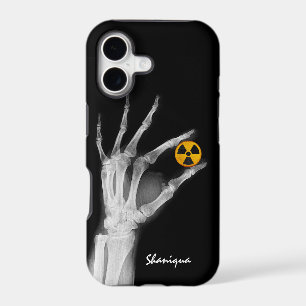 Hand Holding a Radiation Symbol