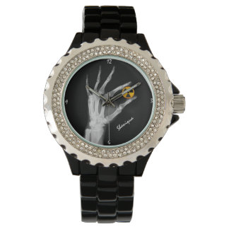 Hand Holding a Radiation Symbol    Watch