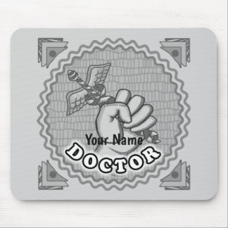 Hand holding caduceus doctor mouse mat