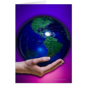 Hand holding earth