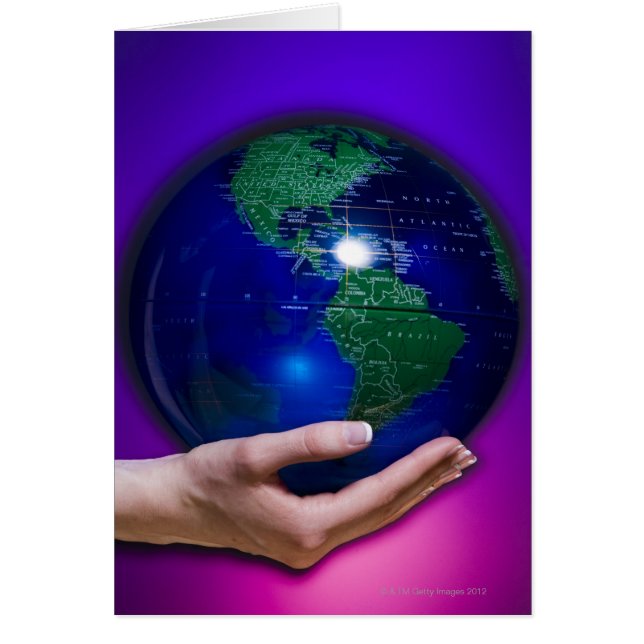 Hand holding earth (Front)