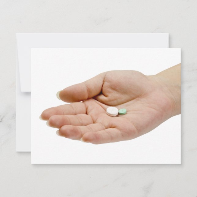Hand holding pills (Front)