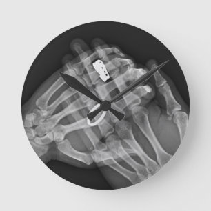 Hand Holding Round Clock