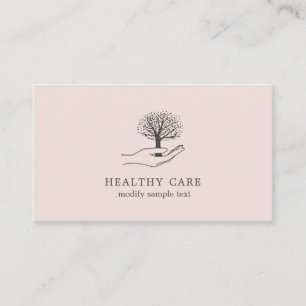 Hand holds tree business card