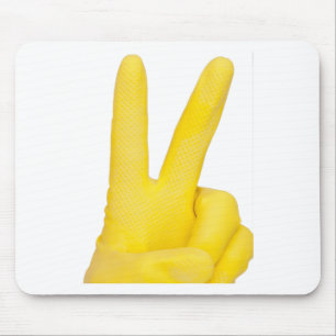 Hand in yellow latex glove mouse mat