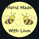 Hand Made with Love - Honey Bees with Heart Classic Round Sticker<br><div class="desc">This product line features two sweet bees with a heart.  Whimsical line drawing - perfect for any hand made gift for an anniversary,  wedding or baby shower.  Text is fully customisable so you can personalise for your special occasion.</div>