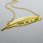 Hand Stamped Feather Necklace<br><div class="desc">This original design features a highly detailed feather pendant hand stamped with the words "free as a bird" and hangs from a dainty high quality chain. Each letter is individually hand stamped by me one at a time so the alignment of characters, spacing, and depth of the impression will vary...</div>