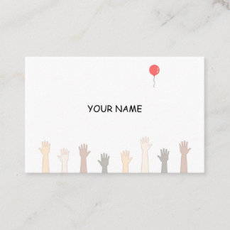 Hands and a red balloon. business card