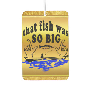 Hands apart showing a fish and a boat with water car air freshener