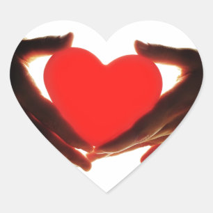 Hands holding heart heart sticker