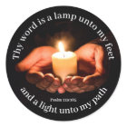 Hands Holding Lighted Candle with Bible message